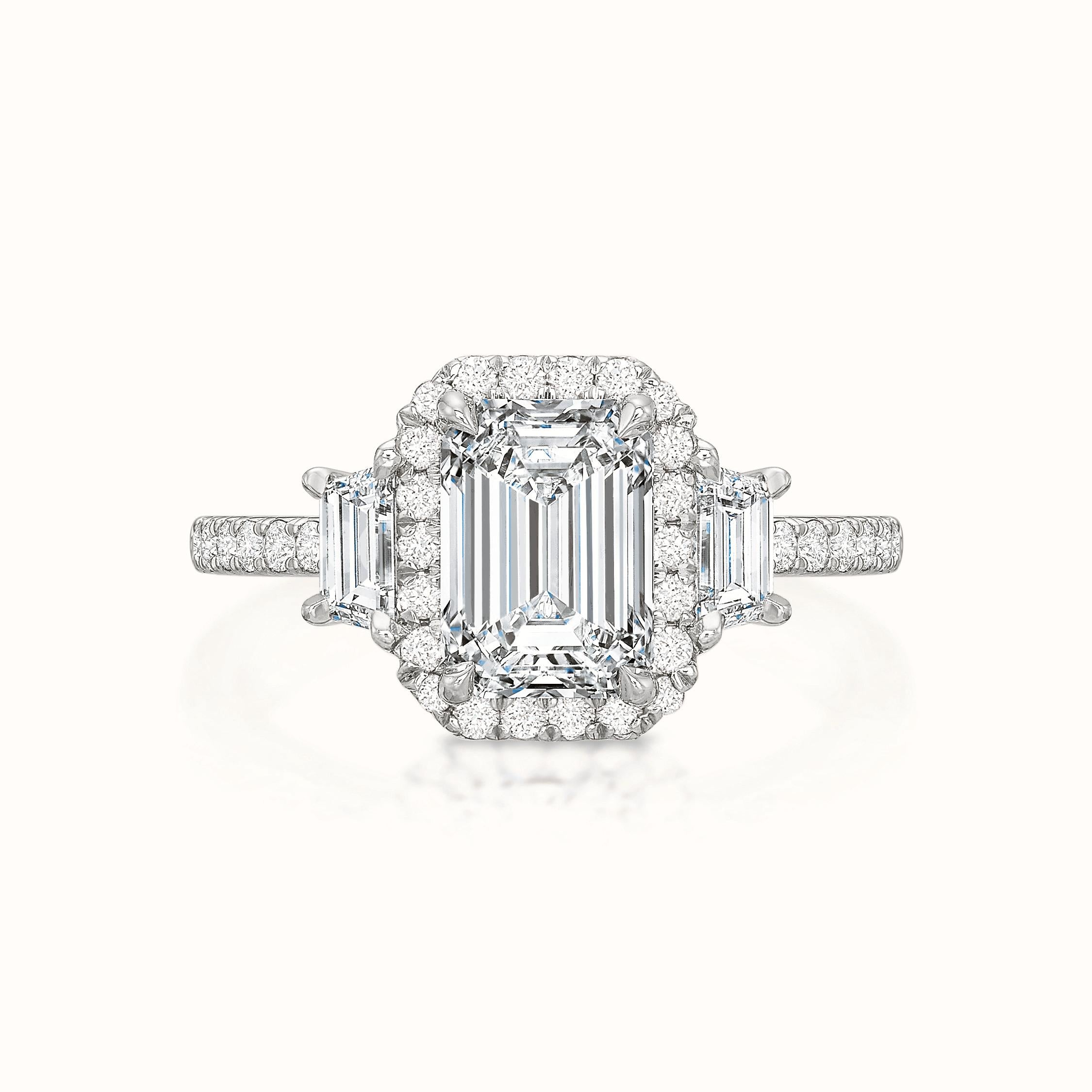 Kate Diamond Halo Three Stone Emerald Cut
