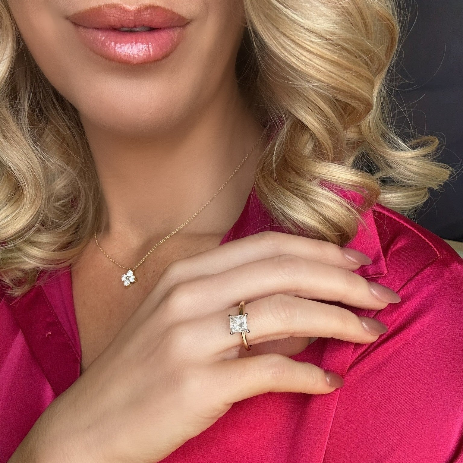 Lifestyle image of a woman wearing a 14k Gold Two Tone Princess Cut Diamond Solitaire Ring