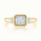 Aubri Bezel Set Three Stone Cushion Diamond Ring